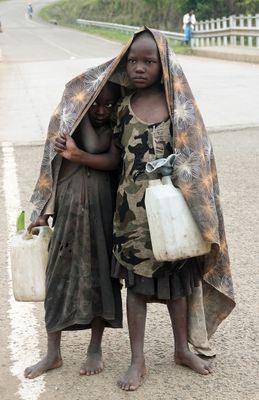 Kids with jerry cans