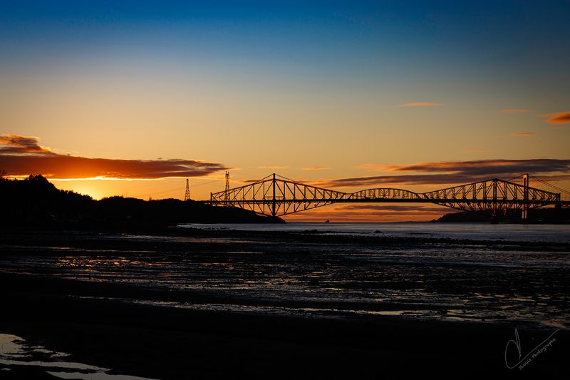 SUNSET OVER QUEBEC BRIDGE