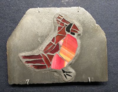 stained glass cardinal on slate