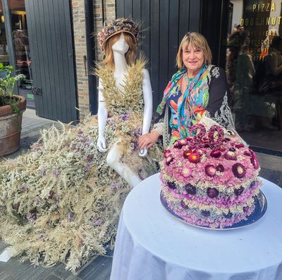 Joan & Friend Admiring Chelsea Street Flowers