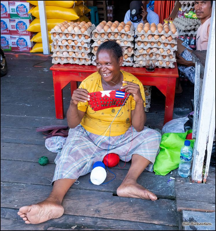 Agats woman knitting.jpg