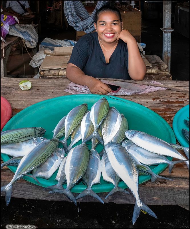 Monumere village lady selling fish.jpg