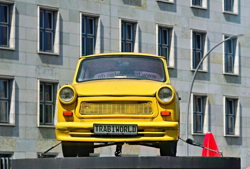 A Trabant car at the Berlin Wall