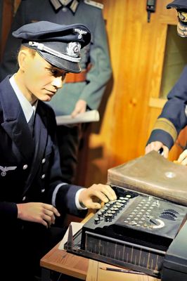 German officer operate the Enigma