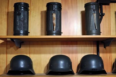 Shelf with helmets