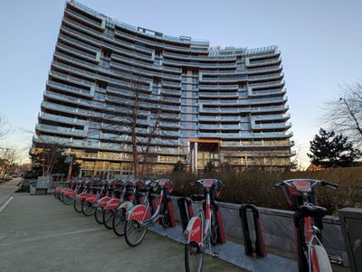 20250120_000114013 Row of Bikes curved building.jpg