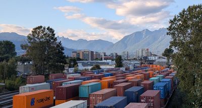 PXL_20250922_004014789 Tracks freight cars mountains.jpg
