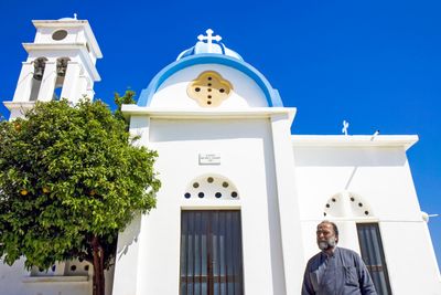 The priest and his church