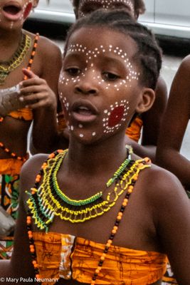 Young girl dancing at market