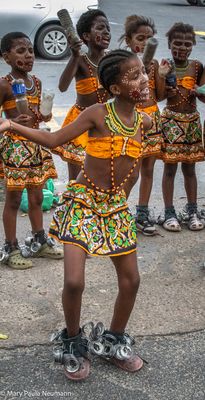 Young girls dancing at market