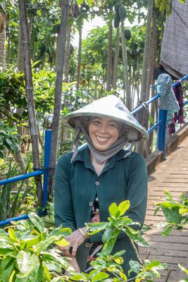 Vietnamese woman working on farm