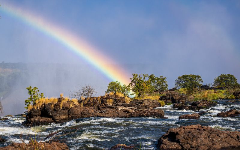 The rainbow from above the falls.