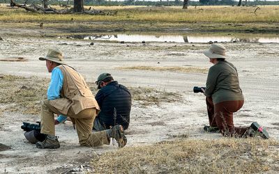 Tom, Tristan, and Leigh shooting baboons.