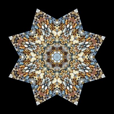 Kaleidoscopic creation done with stones seen in a riverbed