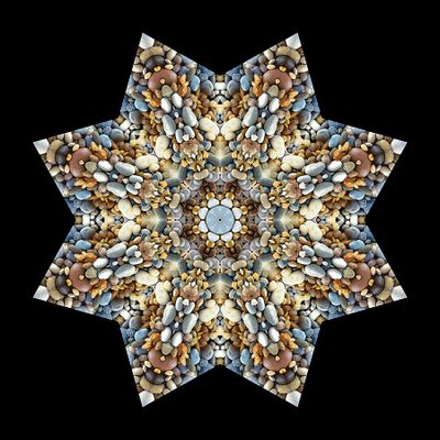 Kaleidoscopic creation done with stones seen in a riverbed