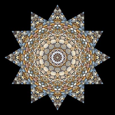 Kaleidoscopic creation done with stones seen in a riverbed