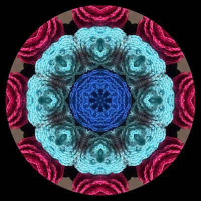 Kaleidoscopic picture created with textile art