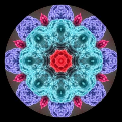 Kaleidoscopic picture created with textile art