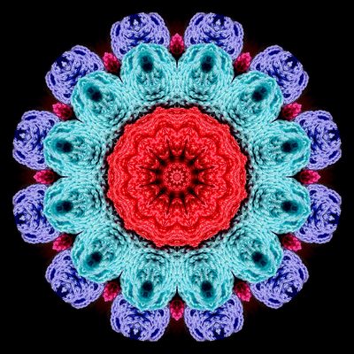 Kaleidoscopic picture created with textile art