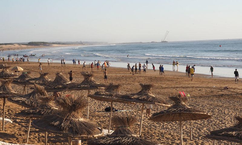 The beach scene in the evening