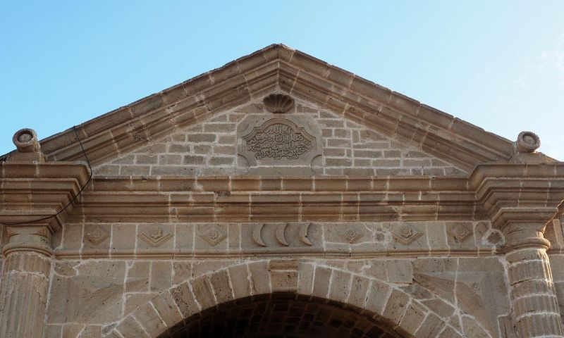 Symbols on the gate at the port