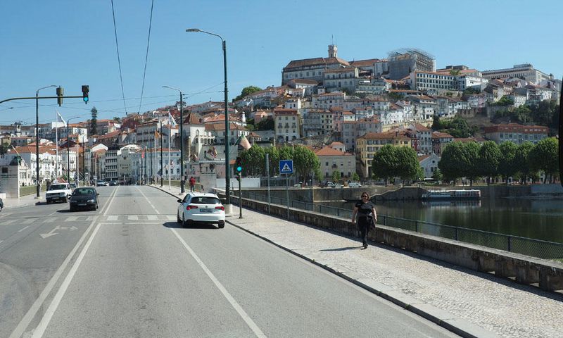 Crossing the Mondego river on the Ponte de Santa Clara