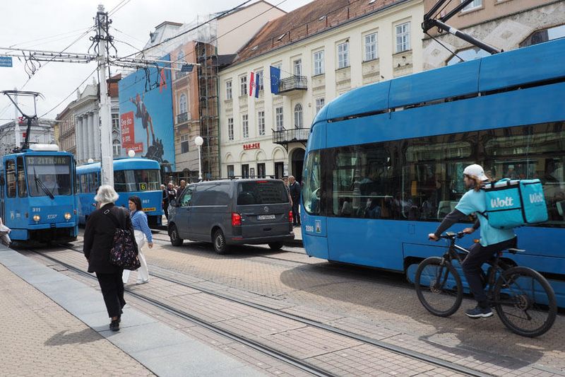 At the tram stop in Central Square
