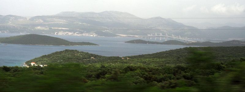 The bay with the  Pelješac Bridge in the distance