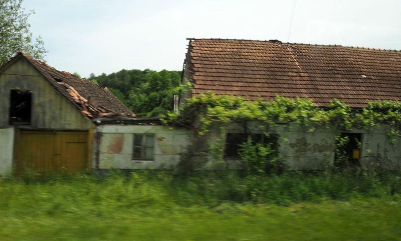 Abandoned building by the roadside