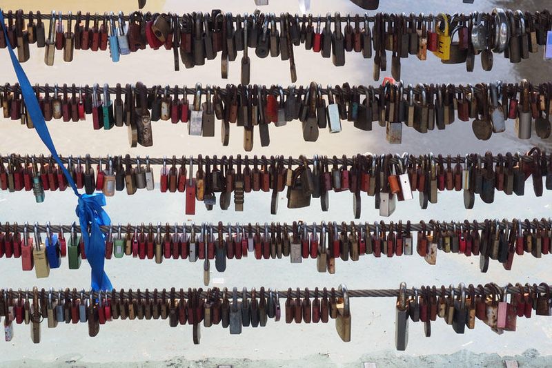 Lover's locks on the railings of the Dragon bridge