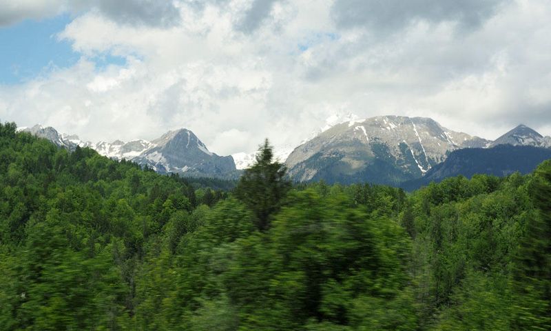 Snow capped mountains on the way to Lake Bohinj