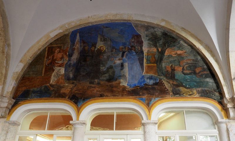 One of the frescos of the life of St. Francis along the sides of the cloister