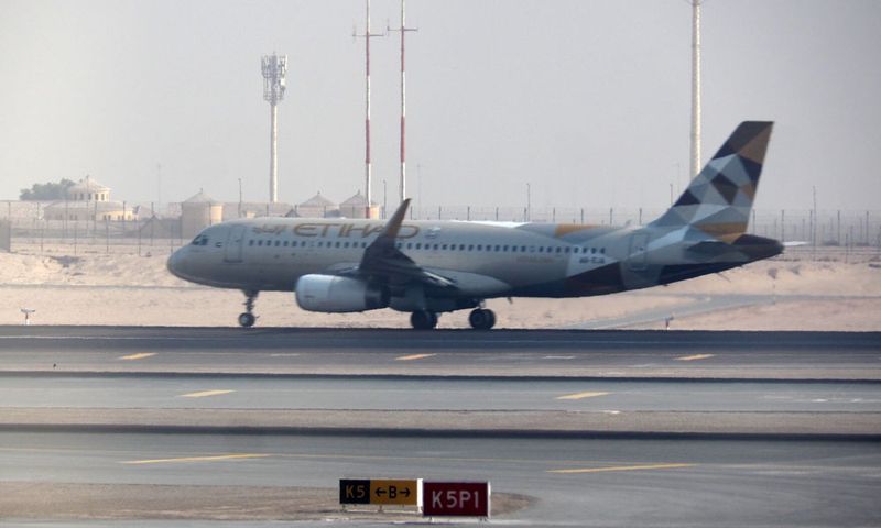 Etihad Airlines A320 class aircraft rotating for takeoff