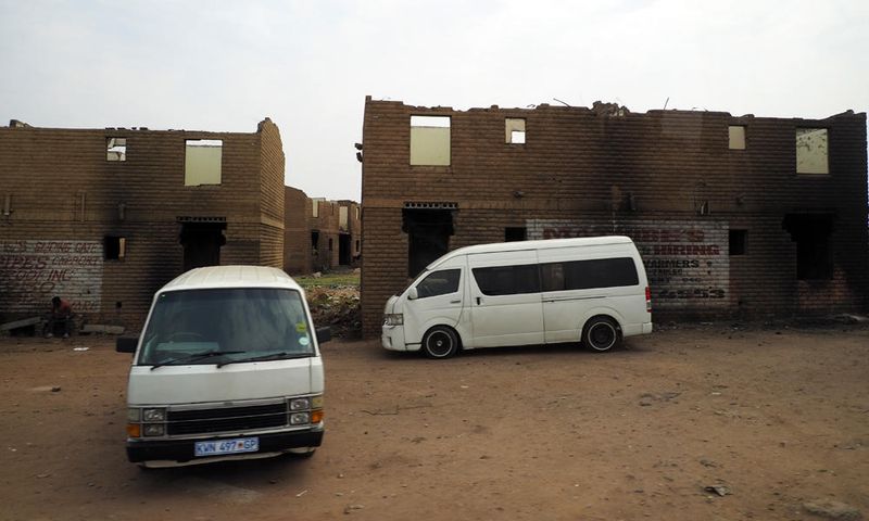 Unfinished apartments burnt during the time of COVID in Soweto