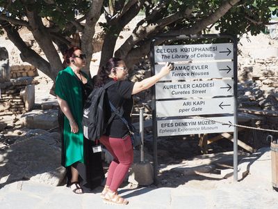 Sign and tour group members