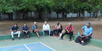 The gang playing basketball