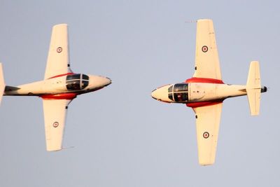 CF Snowbirds solos crossing