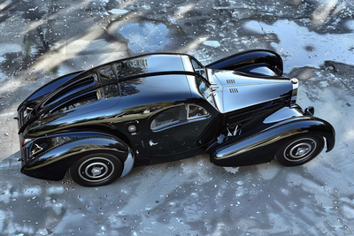 studiogh_a_Bugatti_sports_car_designed_hr_giger__various_came_acb47831-0cd1-483e-94ac-f9235f15fba6_2.png