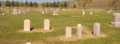 One Man, Two Headstones