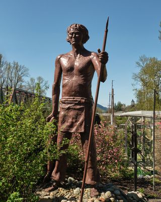 Sultan John: 13-Foot-Tall Man with Fish