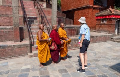 Ros engaging with some monks