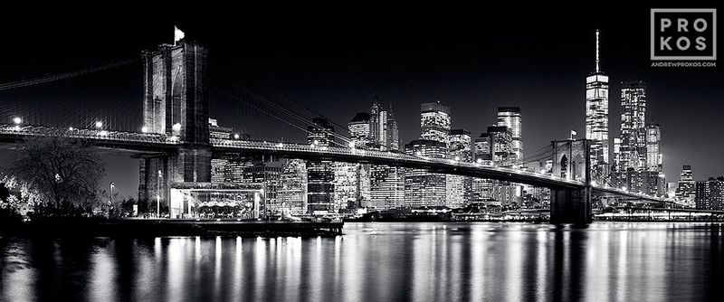 Black and white photographs fine art photo print of the Brooklyn Bridge and Manhattan skyline at night found in the night photographs, New York skylines, Brooklyn Bridge photos, New York Cityscape galleries of framed art photography artist Andrew Prokos. You can read more about Andrew's work in his pro photography article page.