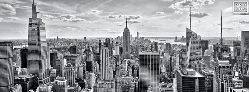 Black and white cityscapes and framed photo prints of the Paboramic view of Empire State Building and Manhattan from Rockefeller Center found in the panoramic photos, New York cityscape, New York skyline photos, Empire State Building, and Rockefeller Center galleries of framed photo art website of artist Andrew Prokos. You can read more about Andrew's work in his pro photography student advice page.