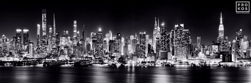 Limited edition black and white photo of the Manhattan skyline at night by master New York skylines photographer Andrew Prokos. Composed of multiple black and white images taken with long exposure photography technique, meticulously merged to create large-format framed photographs up to 120 inches in width. Please inquire regarding additional print sizes. Artwork ships direct from the artist's NYC photo gallery.