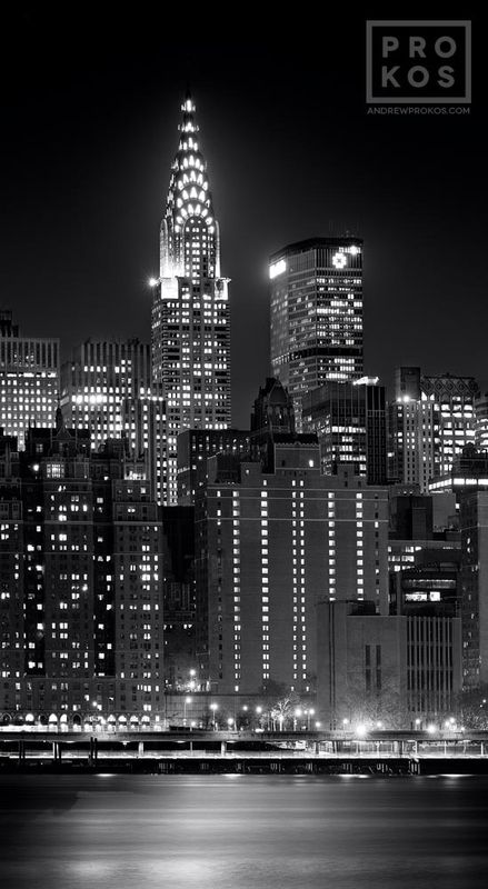 Black and white photographs of the Chrysler building NYC skyline at night by fine art photography artist Andrew Prokos. This high-definition black and white art print of the Chrysler Building is composed of multiple long-exposure images taken with night photo techniques, which are seamlessly merged to create fine art prints. Limited edition prints of this photo are available up to 96 inches in height. Please inquire regarding additional print sizes. Artwork ships direct from the artist's NYC cityscapes gallery.