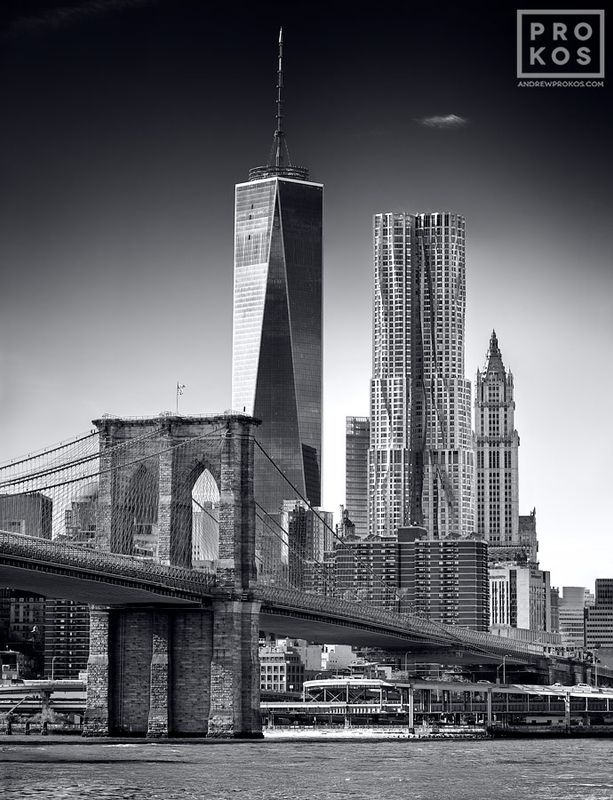 Limited edition black and white photo of the Brooklyn Bridge, World Trade Center, and Lower Manhattan skyline by master New York skyline photographer Andrew Prokos. Composed of multiple high-definition black and white photos of the Brooklyn Bridge seamlessly merged to create  large-scale framed prints up to 90 inches in height. Please inquire regarding additional print sizes. Artwork ships direct from the artist's NYC fine art photography gallery.