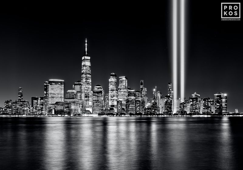 Limited edition black and white photo of World Trade Center Manhattan and Hudson River at night with 9/11 lights by master black and white New York skyline photographer Andrew Prokos. Composed of multiple black and white artwork images taken with night photography technique, meticulously merged to create large-format photography prints up to 120 inches in width. Please inquire regarding additional print sizes. Artwork ships direct from the artist's NYC photography gallery.