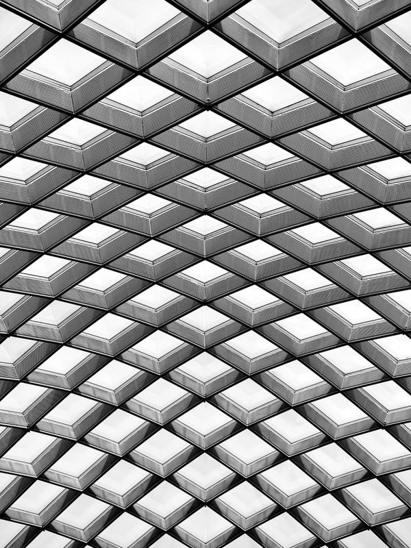 Black and white photos of the warped mesh canopy covering the Kogod Courtyard in the National Portrait Gallery in Washington DC by architecture and fine art photographer Andrew Prokos. Archival pigment print on museum-grade paper. Limited-edition framed art prints and large format prints are available in sizes up to 80 inches. Artwork ships from the artist's New York photo gallery.