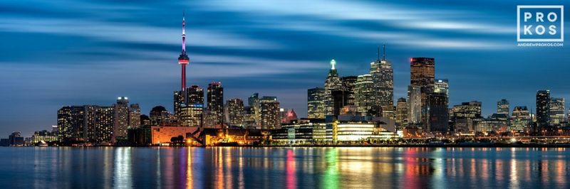 Limited edition cityscape photo of Toronto, Canada at dusk by fine art photographer Andrew Prokos. This panorama of the  Toronto skyline is composed of multiple high-definition images merged to create superbly detailed  photography prints  up to 120 inches in width. Print ships directly from the artist's gallery in NYC, Washington DC, Dubai, or London.