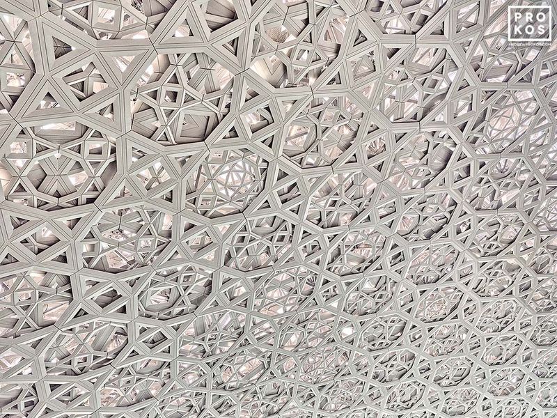 Large-format framed photography and fine art prints of Abu Dhabi architecture, Louvre Abu Dhabi Dome Interior, in the UAE photography gallery of architectural photographer Andrew Prokos. Read more about Andrew's photos in his art photography articles. 